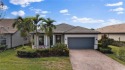 Step into luxury living with this impeccably maintained for sale in Ave Maria Florida Collier County County on GolfHomes.com