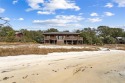 Discover the perfect opportunity to own a spacious waterfront for sale in Gulf Shores Alabama Baldwin County County on GolfHomes.com