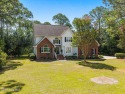 Don't Miss the Opportunity to own this custom home on a large for sale in Shallotte North Carolina Brunswick County County on GolfHomes.com