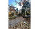 Explore the possibilities with this stunning 5-acre wooded lot for sale in Bennington New Hampshire Hillsborough County County on GolfHomes.com