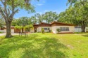 Two Houses for the Price of One! Welcome to this rare for sale in Tampa Florida Hillsborough County County on GolfHomes.com