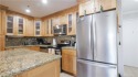 Embrace effortless living in this updated 2-bedroom for sale in Stamford Connecticut Fairfield County County on GolfHomes.com