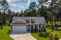 Price Generously Reduced! This 1,520 sq. ft. home is nestled in for sale in Loris South Carolina Horry County County on GolfHomes.com