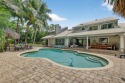 Live, work & play in your own tropical oasis! Nestled on over 1 for sale in Palm City Florida Martin County County on GolfHomes.com