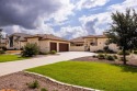 Stunning hill country home overlooking the golf course, pond and for sale in Kerrville Texas Kerr County County on GolfHomes.com
