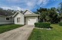 Welcome to your serene sanctuary in the exclusive, gated Golf for sale in New Port Richey Florida Pasco County County on GolfHomes.com