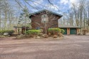 Overlooking the Timber Trails golf course, 203 Golfers Way for sale in Pocono Pines Pennsylvania Monroe County County on GolfHomes.com