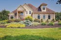 Custom built one and a half story home over a walkout basement for sale in Bloomington Indiana Monroe County County on GolfHomes.com