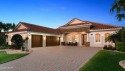 An exquisite residence situated within the gated Portofino for sale in New Smyrna Beach Florida Volusia County County on GolfHomes.com