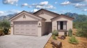 Discover luxury living in this brand-new, three-bedroom, gem for sale in Green Valley Arizona Pima County County on GolfHomes.com