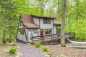 Say hello to summer at Wilderness Escape, a charming Innsbrook for sale in Innsbrook Missouri Warren County County on GolfHomes.com