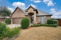 Impeccably maintained DR Horton stone & brick elevation beauty for sale in Fort Worth Texas Tarrant County County on GolfHomes.com