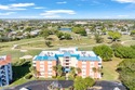 Step inside this classic Naples condo situated on The Hibiscus for sale in Naples Florida Collier County County on GolfHomes.com