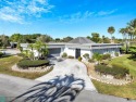 This home is the epitome of mid-century charm in this for sale in Tamarac Florida Broward County County on GolfHomes.com