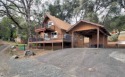 CLASSIC MOUNTAIN CABIN located inside the gated Yosemite for sale in Groveland California Tuolumne County County on GolfHomes.com