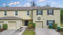 Practically brand new 3 bed 2 1/2 bathroom townhome move-in for sale in Holly Hill Florida Volusia County County on GolfHomes.com
