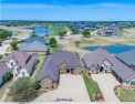 Custom built golf course home in exclusive Harbor Lakes for sale in Granbury Texas Hood County County on GolfHomes.com