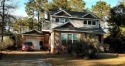 This custom built home in desirable St. James Bay comes with an for sale in Carabelle Florida Franklin County County on GolfHomes.com