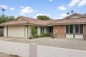 Welcome to this well cared for and move-in ready home in Dobson for sale in Mesa Arizona Maricopa County County on GolfHomes.com
