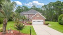 Welcome to 4635 Shaddowood Court, a beautifully updated 4 for sale in Myrtle Beach South Carolina Horry County County on GolfHomes.com
