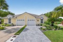 Welcome to this totally updated 2/2 Villa with beautiful & for sale in Lake Worth Florida Palm Beach County County on GolfHomes.com