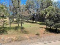 This is a double merged lot located in the Pine Mountain Lake for sale in Groveland California Tuolumne County County on GolfHomes.com