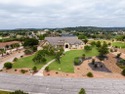 Majestic estate home sitting at one of the highest points in for sale in Kerrville Texas Kerr County County on GolfHomes.com