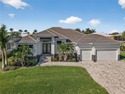 PUNTA GORDA ISLES! STUNNING 3 BEDROOM PLUS OFFICE, 2.5 BATH for sale in Punta Gorda Florida Charlotte County County on GolfHomes.com