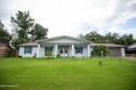 Welcome to this beautifully updated 3-bedroom, 2-bathroom home for sale in Ocean Springs Mississippi Jackson County County on GolfHomes.com