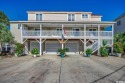 Take in the Spectacular  views from this custom built Channel for sale in North Myrtle Beach South Carolina Horry County County on GolfHomes.com