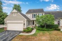 Discover elevated living in this impeccably updated for sale in Bloomfield Hills Michigan Oakland County County on GolfHomes.com