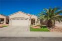 This popular Palm Desert model is move-in ready and filled with for sale in Henderson Nevada Clark County County on GolfHomes.com