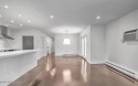 Experience modern elegance in this stunning top-floor condo for sale in Manalapan New Jersey Monmouth County County on GolfHomes.com