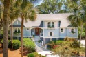 Beautiful custom-built home with expansive lagoon and golf for sale in Seabrook Island South Carolina Charleston County County on GolfHomes.com