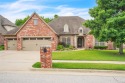 A RARE JEWEL: Exquisite single-level home in the gated for sale in Broken Arrow Oklahoma Wagoner County County on GolfHomes.com