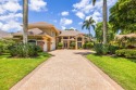 Located on the 16th hole of The Match Course at PGA National for sale in Palm Beach Gardens Florida Palm Beach County County on GolfHomes.com