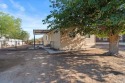 This fully updated, 3-bedroom 2 bath home is move-in ready and for sale in Thatcher Arizona Graham County County on GolfHomes.com