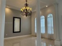 Stunning lakefront home in the gated community of Fairways at for sale in Homestead Florida Miami-Dade County County on GolfHomes.com
