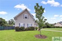 Step into this exquisitely spacious former model home! Revel in for sale in Richmond Hill Georgia Bryan County County on GolfHomes.com