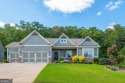 Peaceful living meets modern comfort in this stunning Canton for sale in Canton Georgia Cherokee County County on GolfHomes.com
