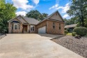 Walking distance to the Metfield Clubhouse and golf course, and for sale in Bella Vista Arkansas Benton County County on GolfHomes.com