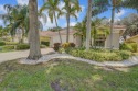 RARELY AVAILABLE EXTENDED GENOVA MODEL SET ON A BEAUTIFUL CANAL for sale in Boynton Beach Florida Palm Beach County County on GolfHomes.com