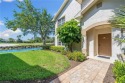 Spectacular views of stacked stone pond  golf course are the for sale in Naples Florida Collier County County on GolfHomes.com