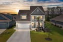 Welcome to West Lake at Cane Bay where golf cart living for sale in Summerville South Carolina Berkeley County County on GolfHomes.com