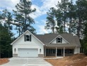 Welcome home to Fairfield Plantation Lake Community! You'll fall for sale in Villa Rica Georgia Carroll County County on GolfHomes.com