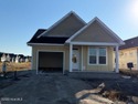Welcome to easy coastal living in The Beaufort Club! This for sale in Beaufort North Carolina Carteret County County on GolfHomes.com