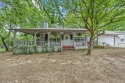 Immaculate home on 3 wooded lots in highly sought-after gated for sale in Holly Lake Ranch Texas Wood County County on GolfHomes.com