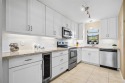 Beautifully updated 2BD/2BA condo at The Palms of Deer Creek in for sale in Deerfield Beach Florida Broward County County on GolfHomes.com
