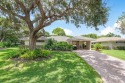 Welcome to your tranquil retreat featuring a captivating garden for sale in Boynton Beach Florida Palm Beach County County on GolfHomes.com