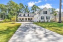 Welcome to 95 Red Tail Hawk Loop, a stunning residence nestled for sale in Pawleys Island South Carolina Georgetown County County on GolfHomes.com